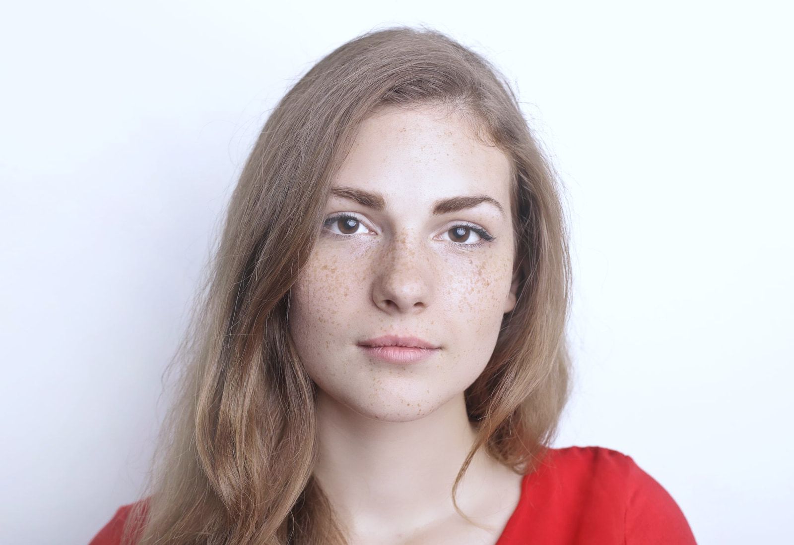 The same portrait with the fresh preset: a cooler, clean colour and brighter eyes